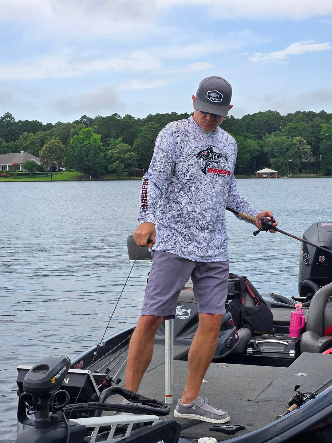 ShredFin Contourz Performance Shirt in white and black, lightweight athletic shirt with a fitted design and moisture-wicking fabric.