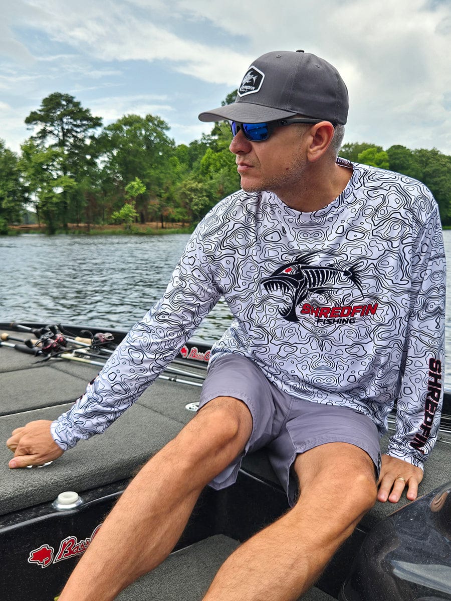 ShredFin Contourz Performance Shirt in white and black, fitted athletic shirt with sleek design and moisture-wicking fabric.