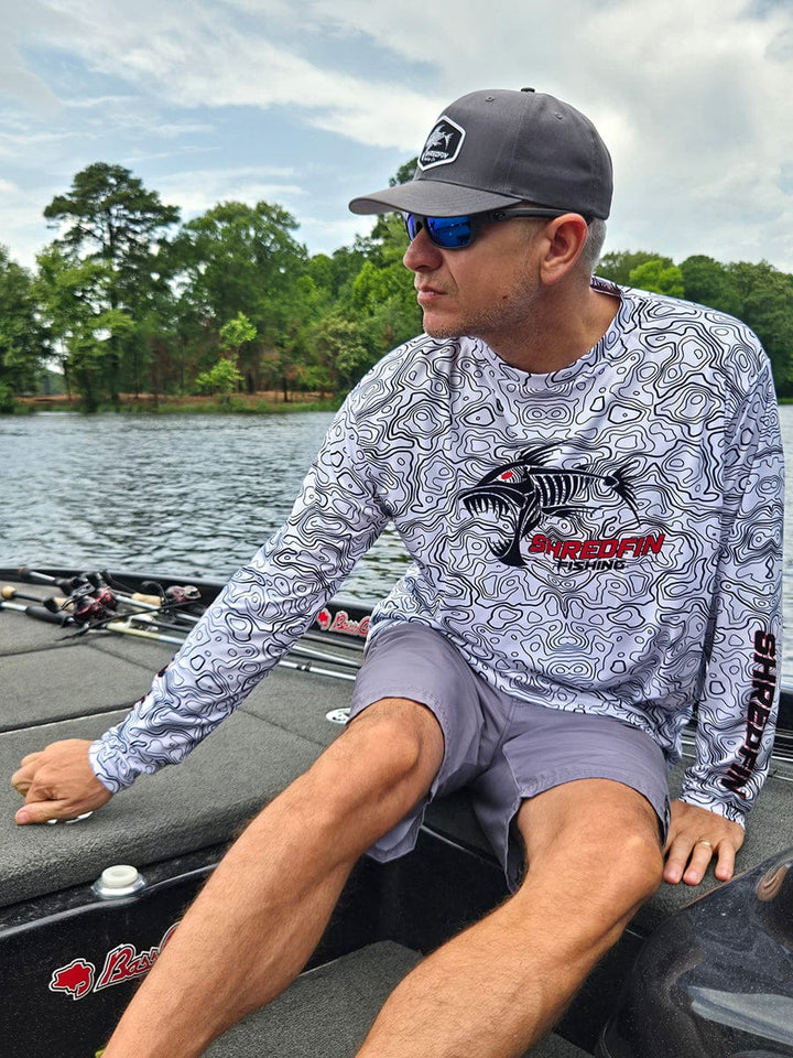 ShredFin Contourz Performance Shirt in white and black, fitted athletic shirt with sleek design and moisture-wicking fabric.