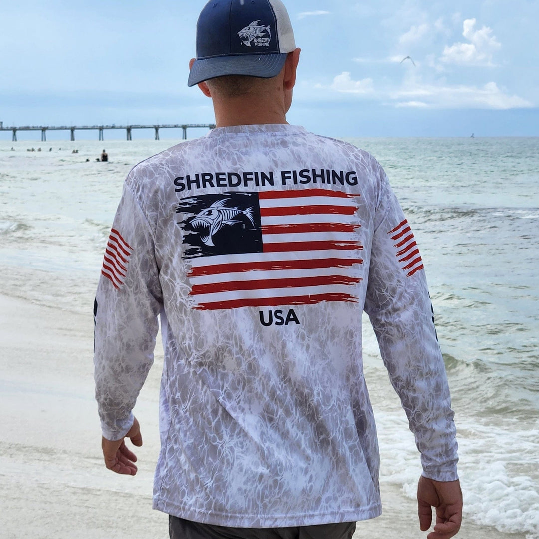 ShredFin Freedom Performance Shirt, men's athletic shirt in navy with short sleeves and moisture-wicking fabric.