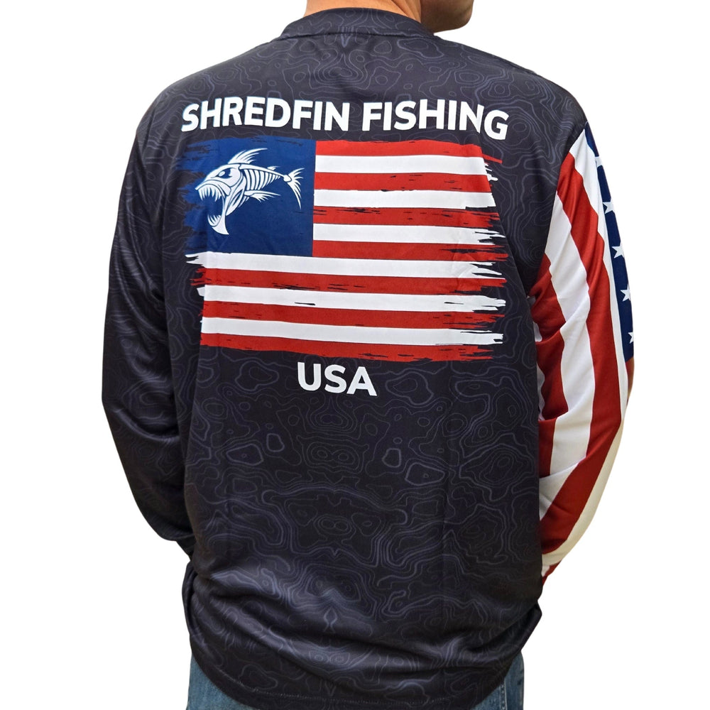 ShredFin Freedom Sleeve performance shirt with sleek design, moisture-wicking fabric, and comfortable fit for active wear.