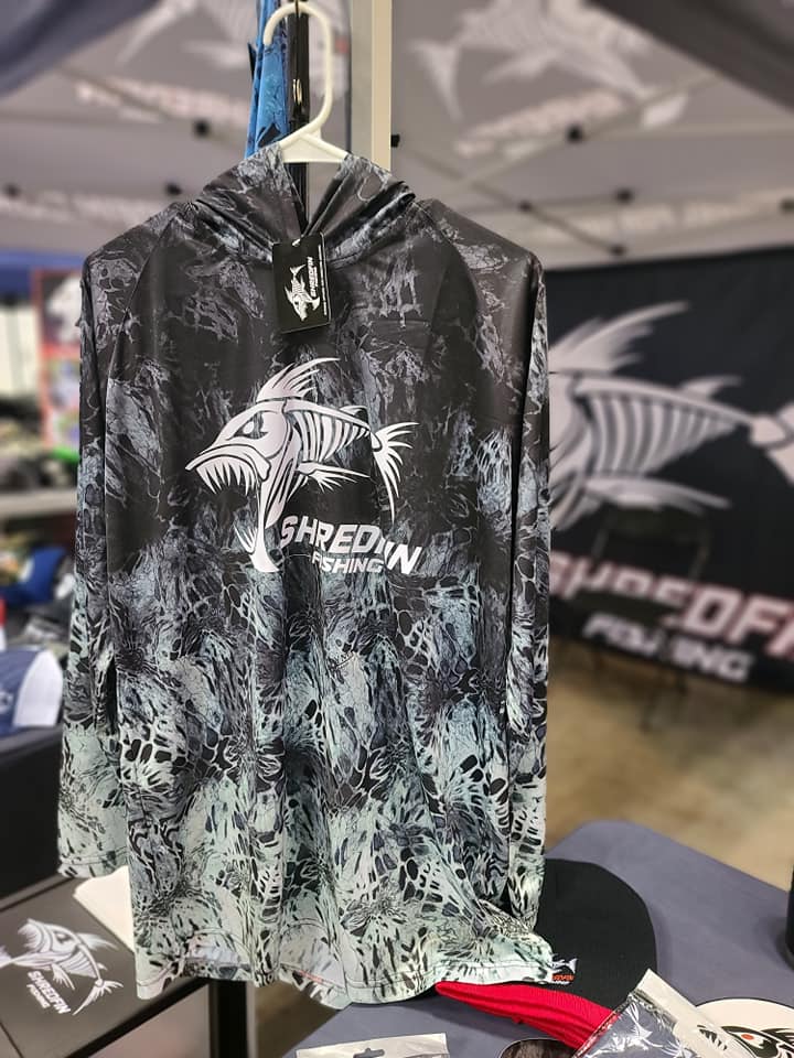 ShredFin Prym1 Camo Hooded Performance Shirt in Typhoon camouflage, featuring a hood and athletic fit.