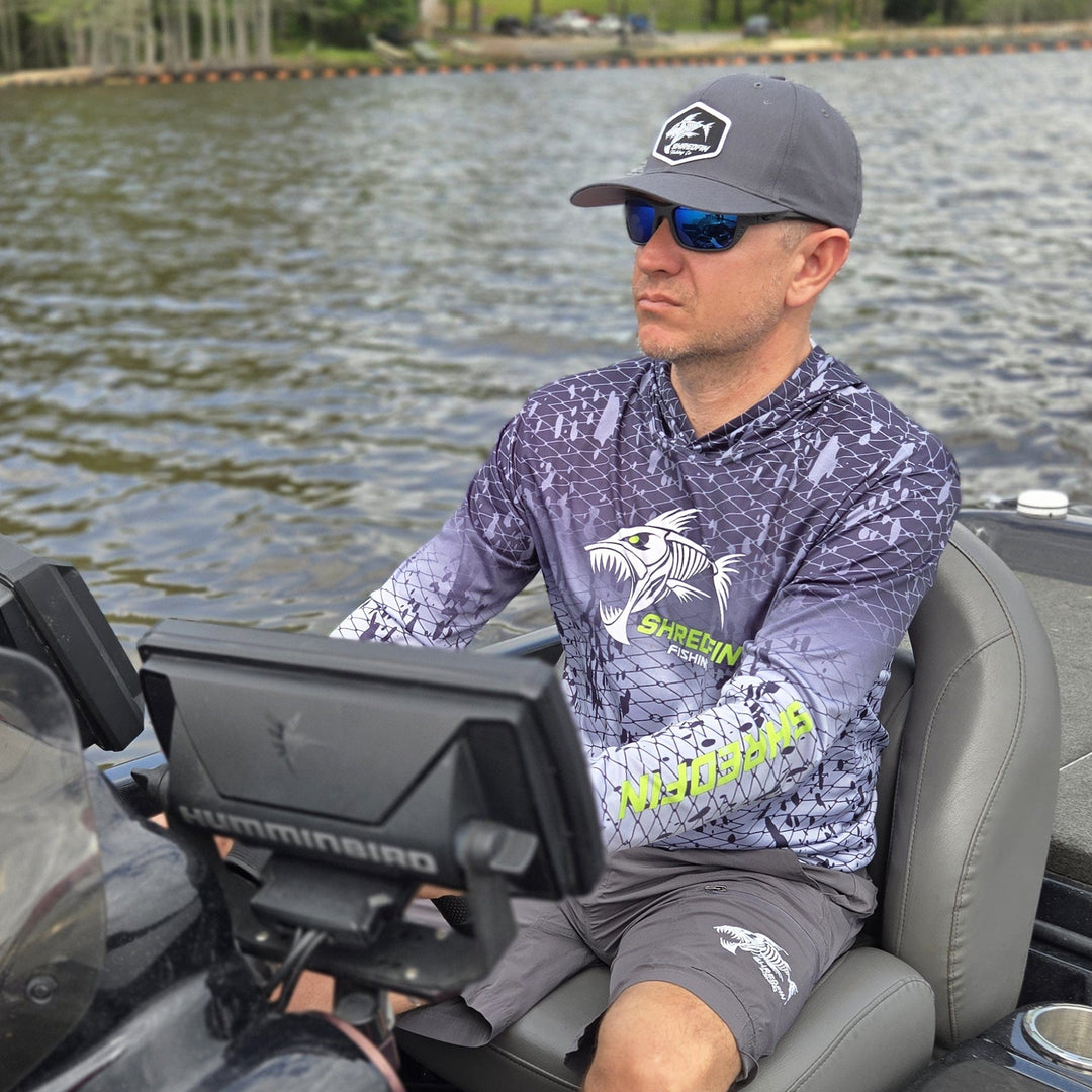 ShredFin Splash Camo Hooded Performance Shirt in Tungsten Gray Fade, featuring lightweight fabric and a stylish camouflage design.