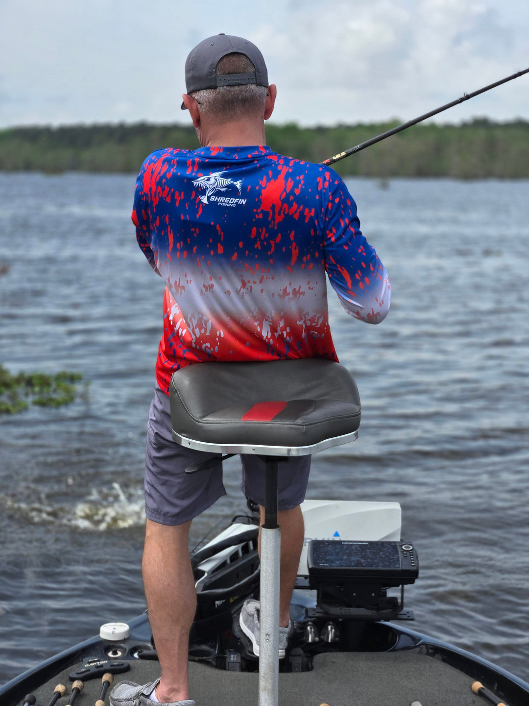 ShredFin Splash Camo Performance Shirt with Freedom Fade design, lightweight athletic shirt featuring a vibrant camo pattern.