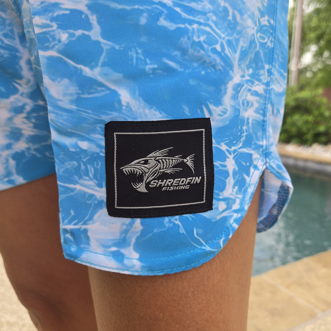 Blue ShredFin RipTide ladies' shorts with a relaxed fit, perfect for casual wear or outdoor activities.