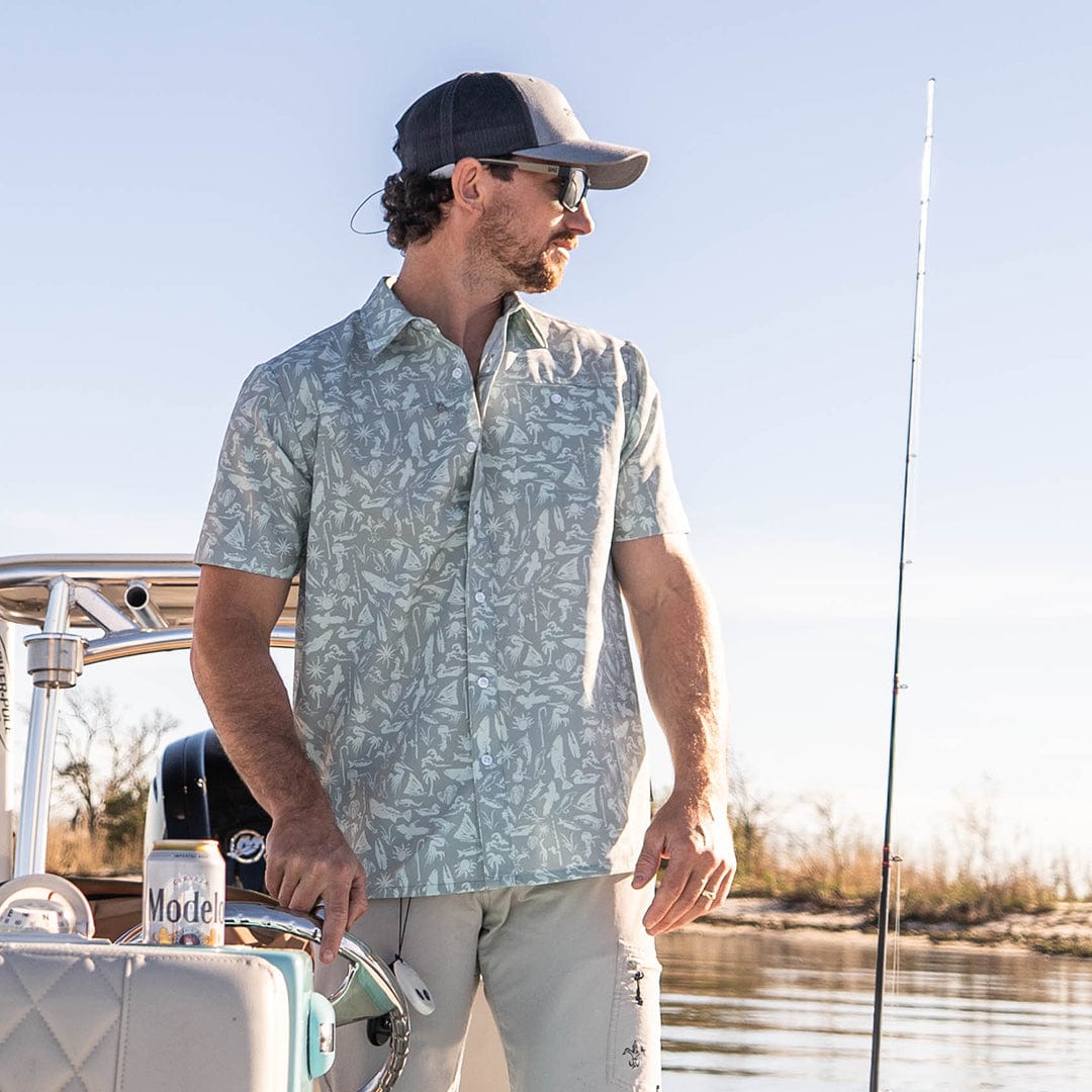 Old-school Fly Shirt by Sportsman Gear, featuring classic fly fishing design and lightweight fabric for outdoor adventures.