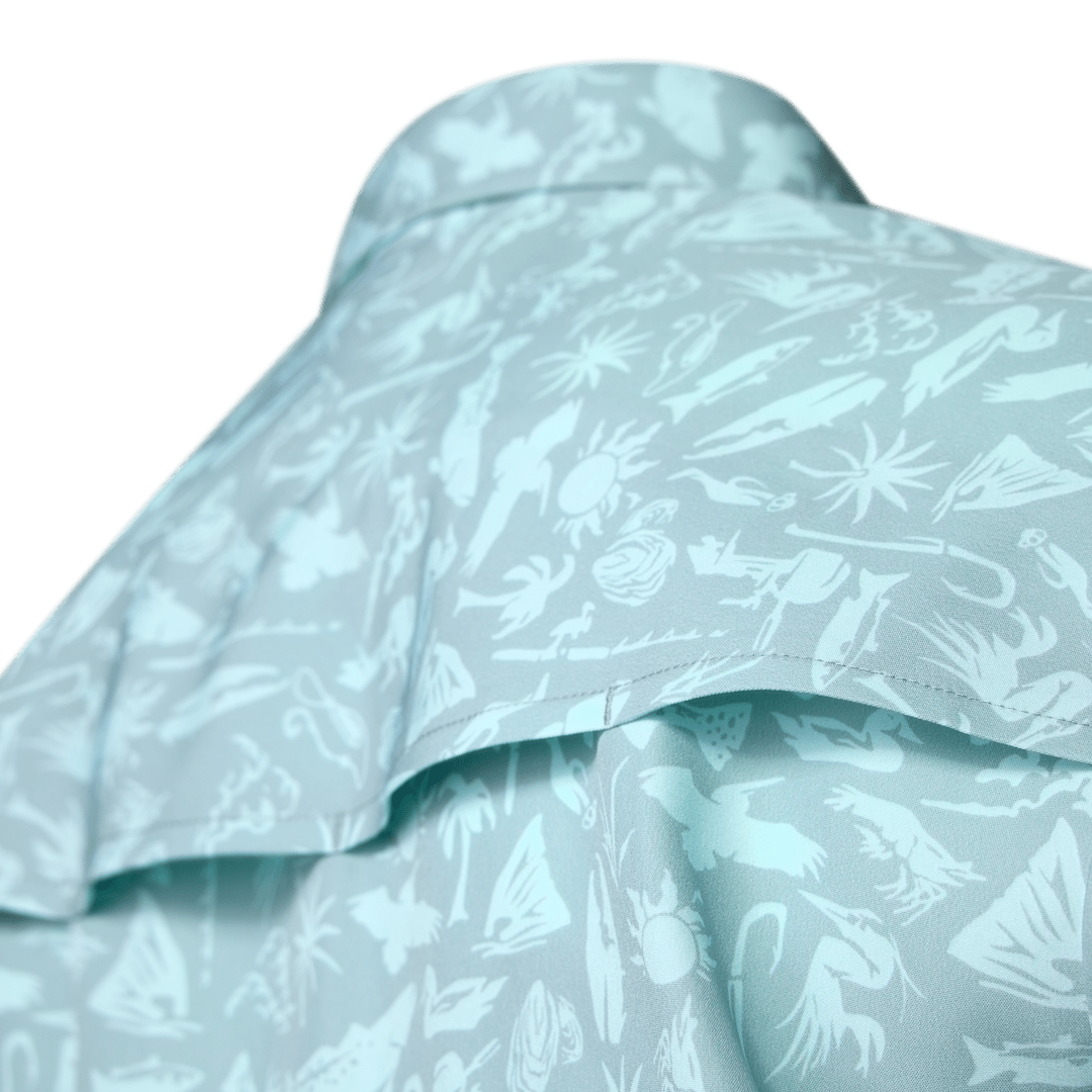 Old-school Fly Shirt by Sportsman Gear, featuring a classic design with fly fishing-inspired details and durable fabric.