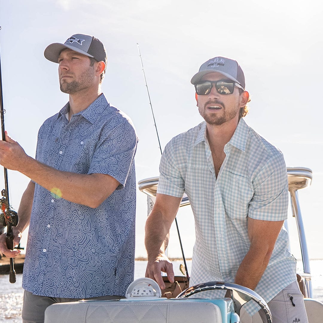 Old-school Fly Shirt by Sportsman Gear featuring a casual design with fly fishing-inspired details.