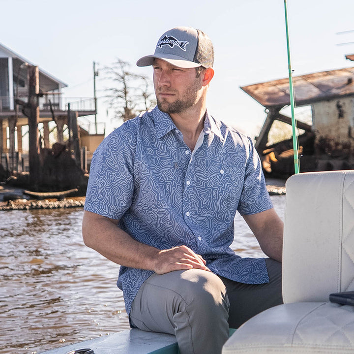 Old-school Fly Shirt from Sportsman Gear featuring a casual, vintage-inspired design with a button-down collar and lightweight fabric.