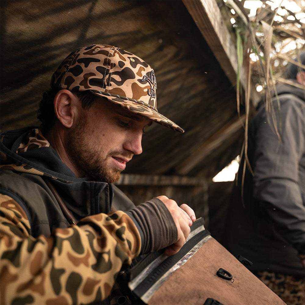 Sportsman Gear Rope Hat with old-school field sportsman style, featuring durable fabric and adjustable rope strap.