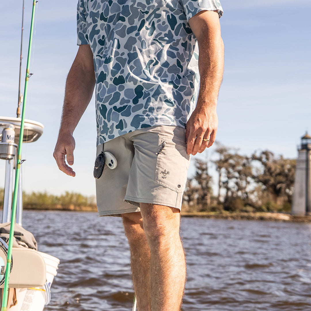 Sportsman Gear Reaper Fishing Shorts 2.0 9-inch men's board shorts with quick-dry fabric and vibrant pattern, ideal for fishing.