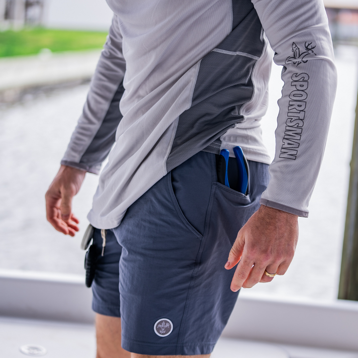 Men's Jetty Fishing Shorts by Sportsman Gear, 7-inch length, lightweight board shorts designed for fishing and casual wear.