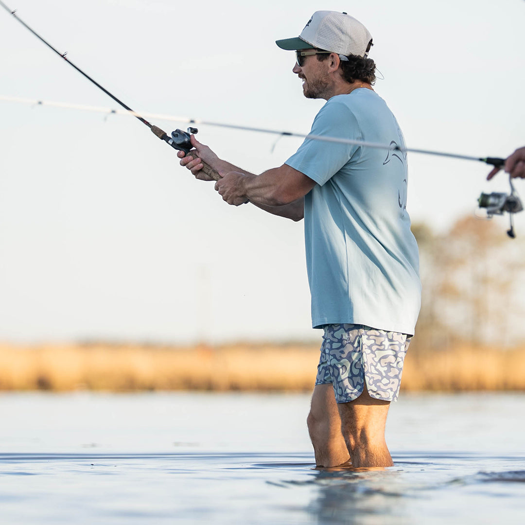 Sportsman Gear men's fishing shorts with infinity camo pattern, lightweight board shorts for outdoor activities and casual wear.