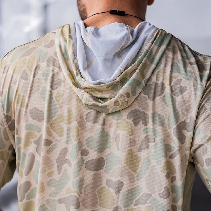 Sportsman Gear Cool Breeze 2.0 performance fishing hoodie in wave blue camo, shown as a lightweight, moisture-wicking shirt.
