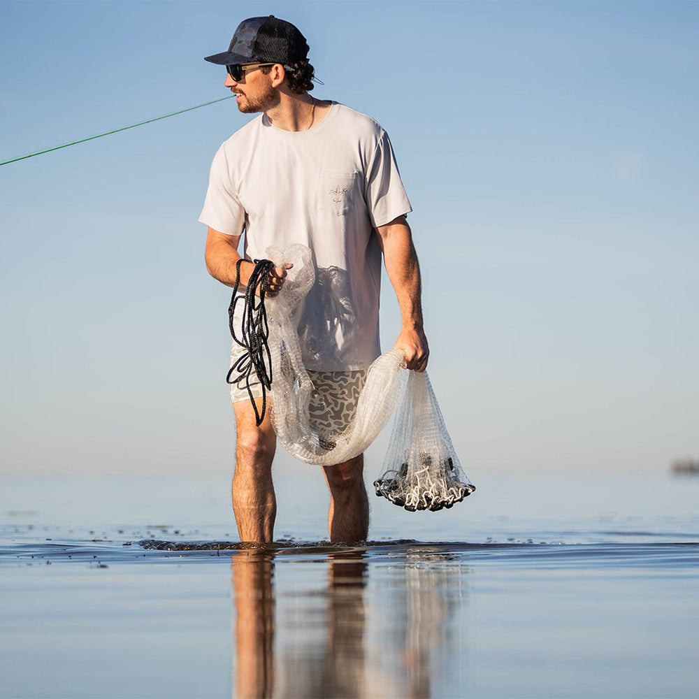 Sportsman Gear Bamboo Pocket T-Shirt, small size, lightweight performance fabric, casual fit, with front pocket, in natural tones.