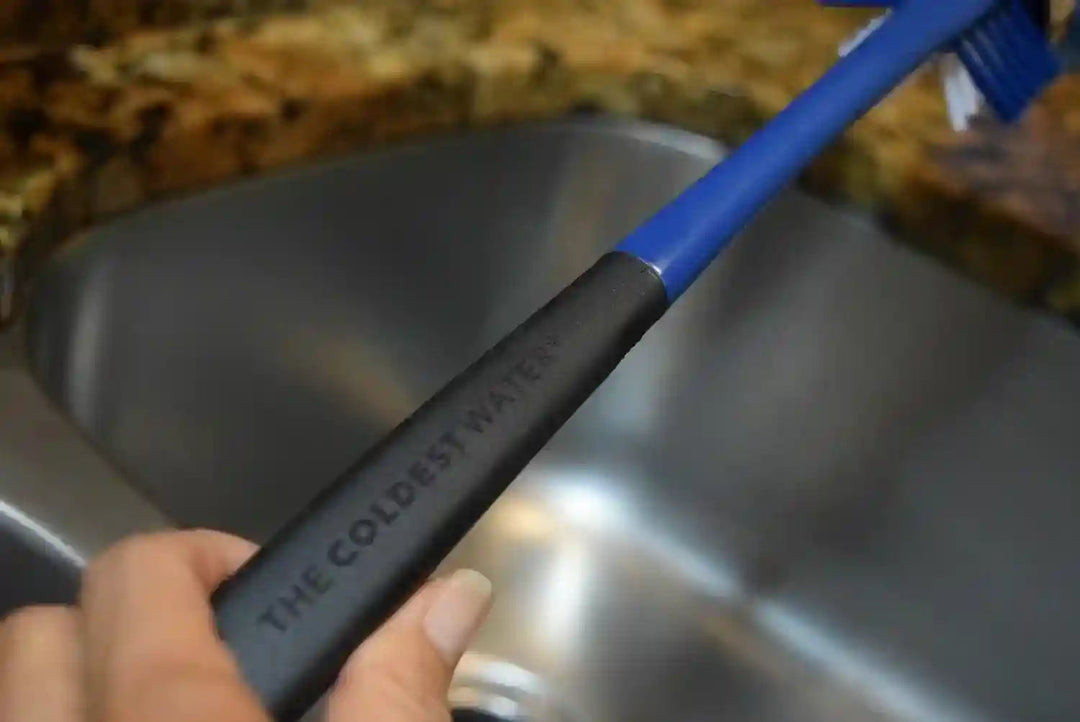 Coldest Water Bottle Brush with three cleaning tools in one, featuring a long handle and brushes for thorough bottle cleaning.