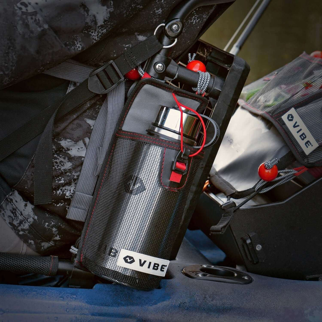 Vibe Kayaks mesh 30 oz bottle holder with bottle, durable accessory for keeping drinks secure during outdoor activities.