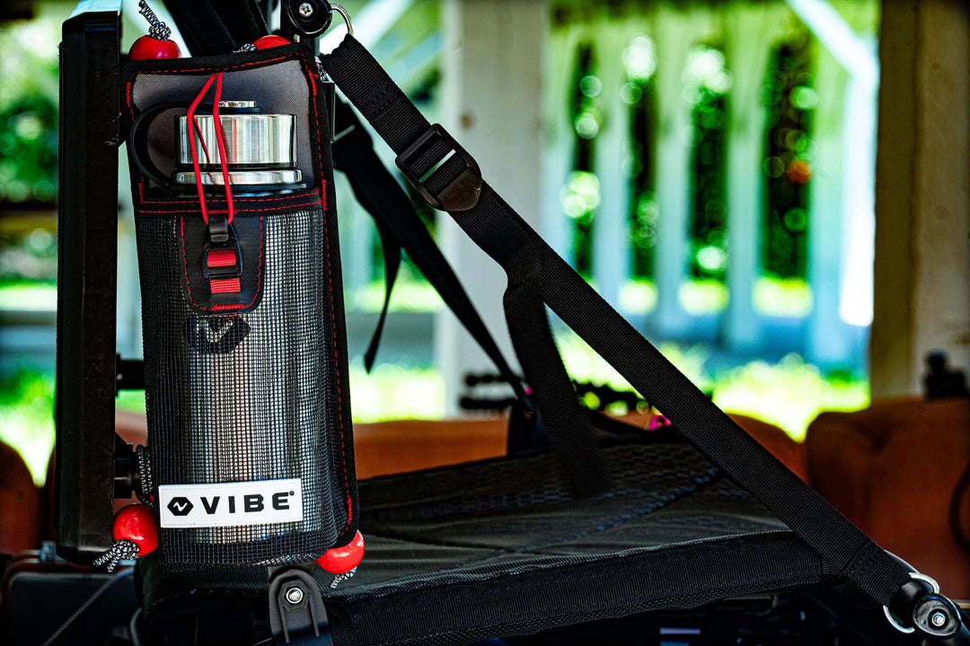 Vibe Kayaks mesh 30 oz bottle holder with attached bottle, waterproof accessory for easy hydration access during kayaking.