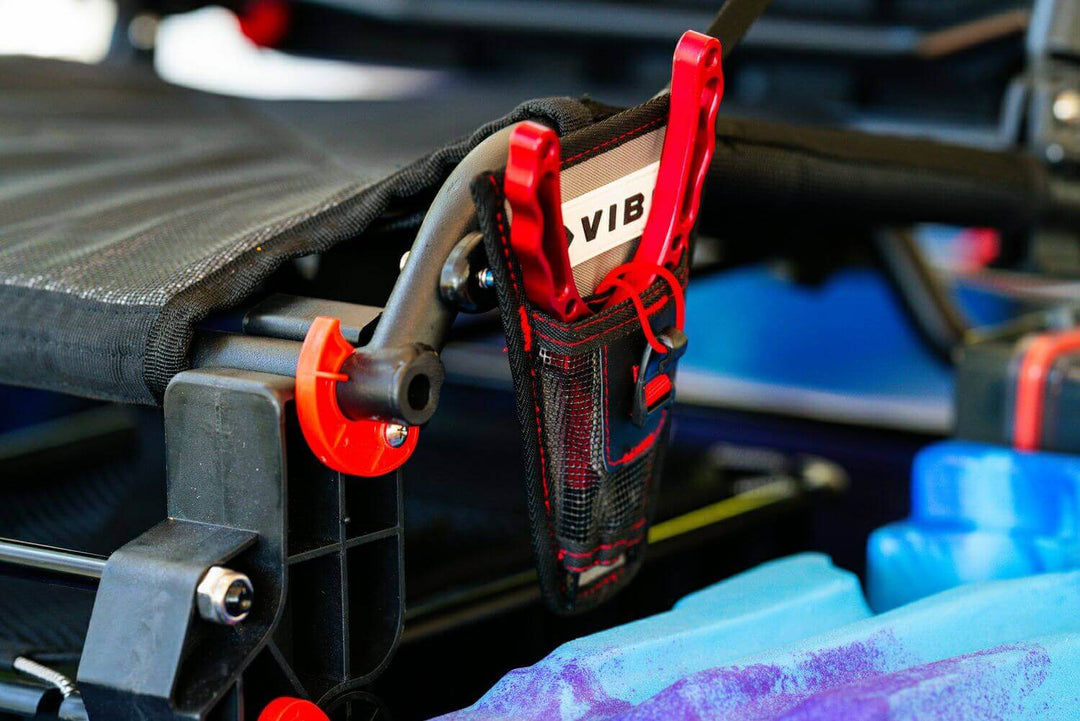 Vibe Kayaks mesh plier holder accessory with secure clip and breathable design for easy access during kayaking activities.