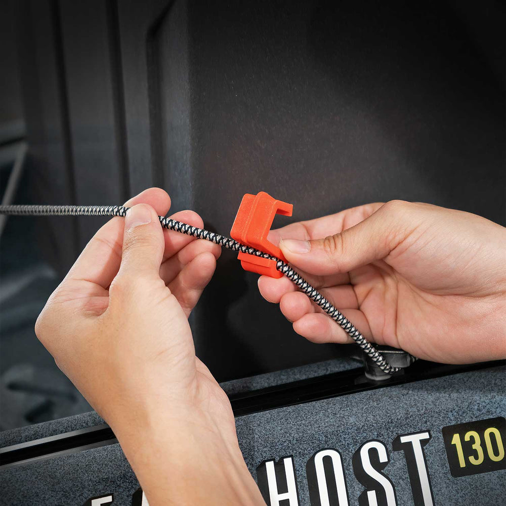 Set of four Vibe Kayaks Versa Bungee Clips, durable accessories for securing gear on kayaks or outdoor gear.