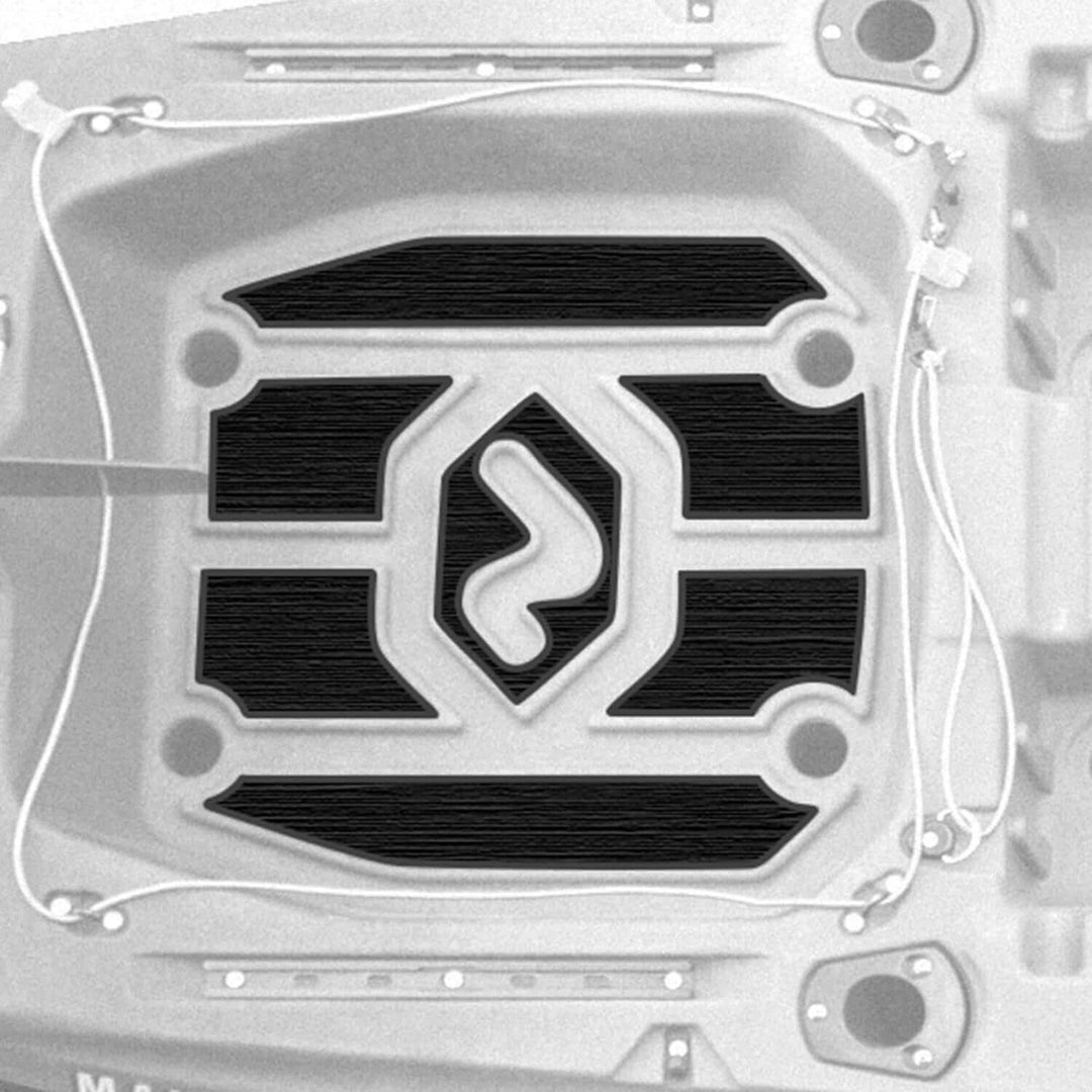 Makana 100 Premium Deck Padding from Vibe Kayaks attached to a black kayak for added comfort and protection.