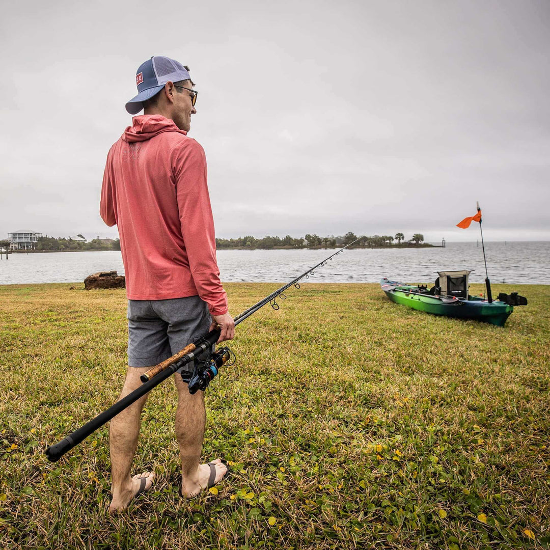 Vibe Performance Hoodie by Vibe Kayaks, navy blue sports apparel with a front pocket and Vibe logo, casual athletic wear.