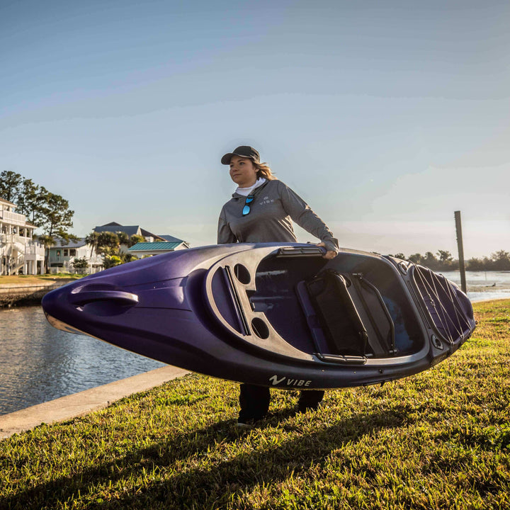 Vibe Performance Hoodie from Vibe Kayaks, showing a navy-blue athletic hoodie with logo on the chest and front pockets.