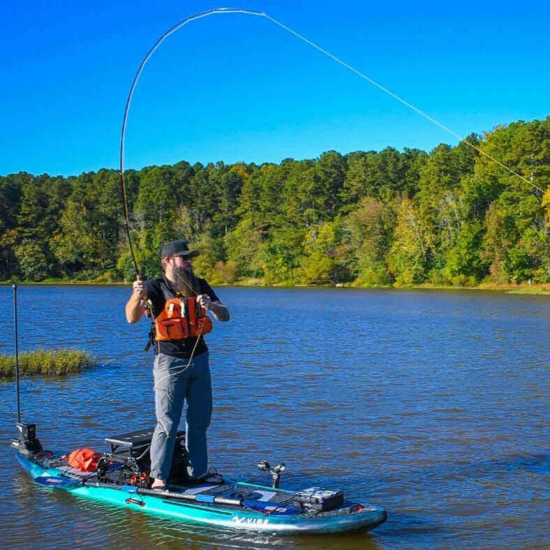 Vibe Cubera 120 Hybrid kayak in Caribbean blue, featuring a sleek design and adjustable seating for versatile paddling.