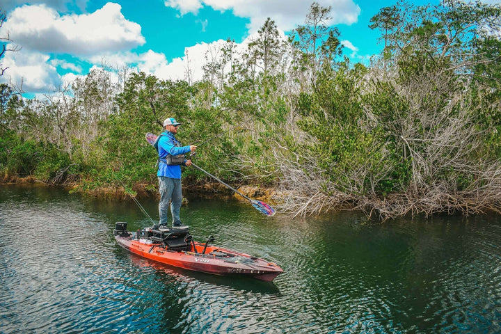 Vibe Shearwater 125 kayak by Vibe Kayaks, featuring a sleek design and seating area in a vibrant galaxy color.