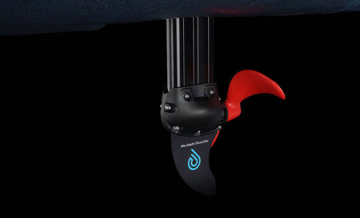 Vibe Kayaks Makana 100 kayak in vibrant color, shown on water with paddles, designed for recreational kayaking.