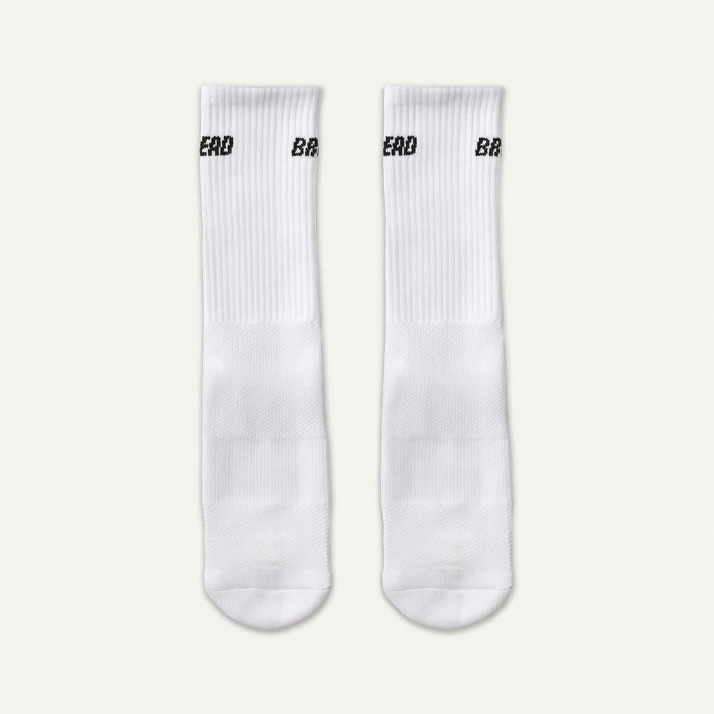 White Bread Crew Socks with ribbed cuffs and soft cotton material, featuring the Bread logo on the ankle for a casual, comfortable look.