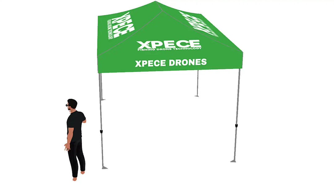 Xpece Drones 10x10 heavy-duty beach tent with sturdy frame and commercial-grade canopy, set up on sandy beach.
